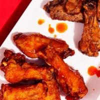 The Ryan · 10 crispy fried chicken wings with a choice of side.