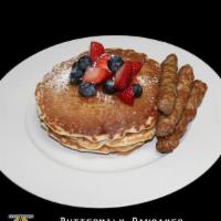 Buttermilk Pancakes · Four stacked pancakes with choice of protein.