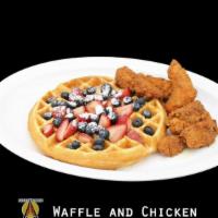 Waffle And Chicken · Enjoy a vanilla Belgian waffle topped with fruit and served with side of chicken strips.
