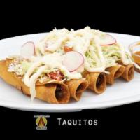 Taquitos · 5 fried rolled tortilla filled with chicken and house spices. topped with cabbage, radish an...