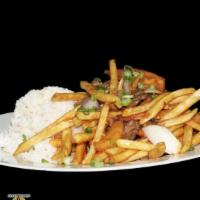 Lomo Saltado · Special sauce tossed with fries, onions, tomatoes and beef. Served with white rice and house...