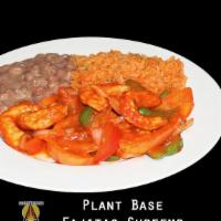 Plant Base Fajitas · Fajitas with red & green bell peppers, onions, tomatoes and protein of your choice tossed wi...