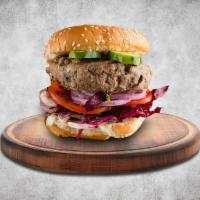 Go Greek Lamb Burger · Lamb burger made with tzatziki, mixed greens, shaved onions, roma tomato