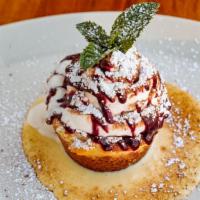 Basta Butter Cake · Delicious butter cake with whipped cream and berry sauce.