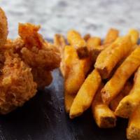 Fried Shrimp Platter · Eight golden fried shrimp with fries and coleslaw.