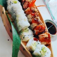 Baked Salmon Roll · California roll, baked salmon on top with sweet dynamite mayo sauce.