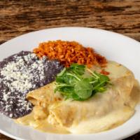 Lobster & Shrimp Enchiladas · creamy tomatillo sauce, melted jack cheese, red rice, refried beans.