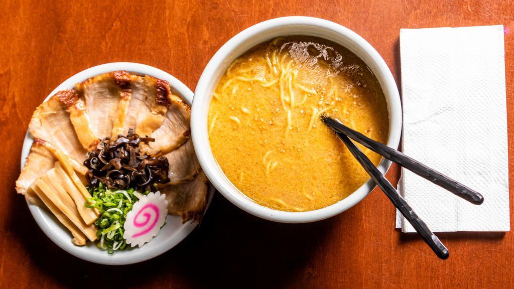 Toroniku Miso Ramen · Soybean paste flavor miso ramen soup is made from a mixture of pork broth and a rich and hearty miso paste. we use different pork broth than the shio ramen to bring out the miso flavor.