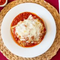 Lasagna · Homemade Meat Lasagna served with our special marinara sauce and melted Mozzarella.