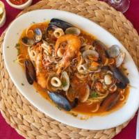 Linguine Alla Pescarese · Fresh Clams, Mussels, Shrimp, and Calamari served in a light red sauce.