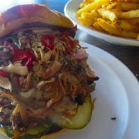 Bbq Pulled Pork Sandwich · Grilled brioche stacked with braised and shredded BBQ pork, mayo, pickles, spicy BBQ slaw, a...