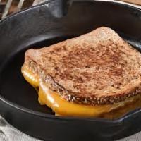 Kids Grilled Cheese · Our popular Canyon Style Grilled Cheese sandwich. Comes with a side