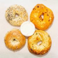 Classic Bagel With Plain Cream Cheese Spread · Any classic bagel with plain cream cheese spread.