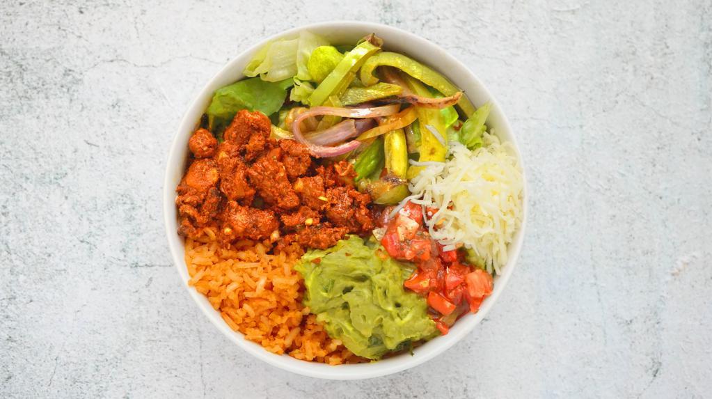 Chicken Al Carbon Burrito Bowl · Chicken thigh meat, spanish rice, black beans, pico de gallo, and shredded cheese over romaine lettuce.