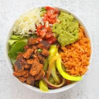 Carnitas Burrito Bowl · Carnitas, Spanish rice, pinto beans, pico de gallo, and shredded cheese over lettuce.