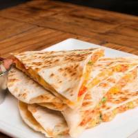 Shrimp Quesadilla · Diced shrimps with cheese, green onions and our cilantro-lime ranch sauce.