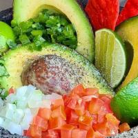 Fresh Guacamole · Chef's favorite, vegetarian. Fresh avocado, onions, serrano, tomato, cilantro, and lime.
