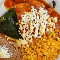 Chile Relleno · Egg battered poblano pepper stuffed with melted monterey jack cheese and corn kernels, cover...