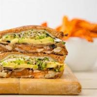 Avocado Melt Sandwich · Avocado, sauteed mushrooms, grilled tomato, Swiss cheese, and alfalfa sprouts on whole wheat...