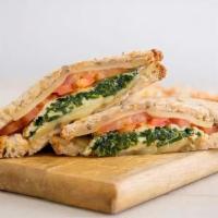 The Power Sandwich · Egg whites, spinach, tomato, and Swiss cheese on multigrain bread.