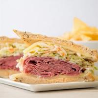 Corned Beef Heaven Sandwich · Corned beef, cole slaw, swiss cheese, and Russian dressing on rye bread.