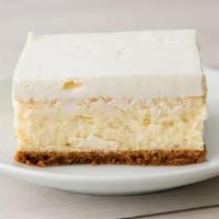 Creamy Cheesecake · Slice of heavenly cheesecake.