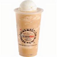 Coffee Ice Blended With Ice Cream · Delicious coffee drink added with more sweetness of topped with vanilla ice cream.