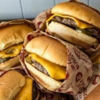 Fast Burger · 3 oz Belcampo Beef Patty, American Cheese, Ketchup, Mustard, Onion, Pickle, Potato Bun.