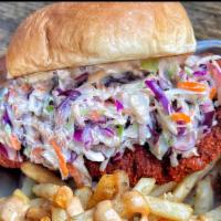 Spicy Fried Chicken Sandwich · Spicy marinated chicken breast, coleslaw, chipotle, pickles on Hawaiian bun and side of garl...