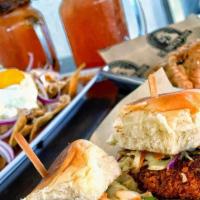 Fried Chicken Sliders · 3 fried chicken sliders topped with coleslaw, pickles & chipotle on a Hawaiian Bun.
(picture...