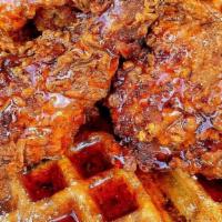 Fried Chicken & Waffle · 3 piece mixed fried chicken on a buttermilk waffle w sugar pearls. Maple syrup & butter on s...
