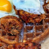 Fried Chicken & Waffle Breakfast  · 3 piece mixed fried chicken on a buttermilk waffle topped w 2 eggs sunny side up, and bacon....