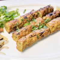 Chicken Seekh Kebab · Freshly ground chicken Marinated in yogurt, rare spices, fresh lime juice & saffron, barbecu...
