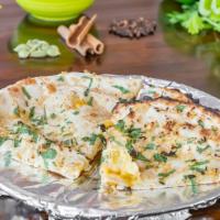 Garlic Cheese Naan · Bread stuffed with cheese and topped with chopped garlic.