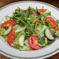 Green Salad · Lettuce, cucumber, tomatoes with dressing.