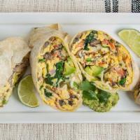 The Burrito That Don’T Eat Meat · Two scrambled eggs,  mushrooms, spinach, grilled onions,  tomato, avocado, and cheese.