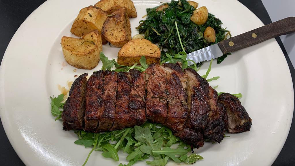 Tagliata Di Manzo (12 Oz) · Sliced New York, Choice, steak, dressed with balsamic sauce, (olive oil, raw garlic, lemon basil) served on a bed of rugola, with sautéed spinach and rosemary roasted potatoes.