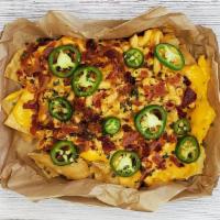 Dirty Mac Nachos · mac and cheese, bacon, jalapeno, cheddar sauce, chives