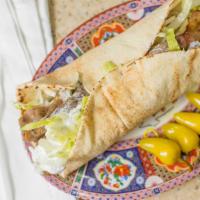 Gyro Sandwich · Beef and lamb gyro with cucumber yogurt sauce.