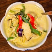 Green Curry · Sliced meat in green curry paste with homemade coconut milk, bamboo shoots, eggplants, bell ...