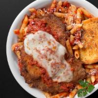 Chicken Parmigiana · Two crispy breaded chicken breasts, topped with tomato sauce, and mozzarella, served with pe...