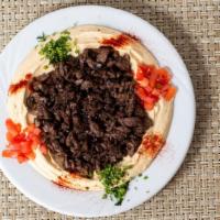 Hummus With Meat · Hummus Topped with Beef Shawarma.
