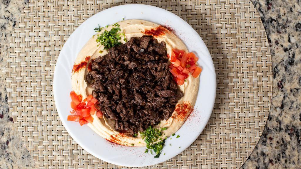Hummus With Meat · Hummus Topped with Beef Shawarma.