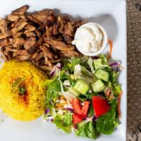 Chicken Shawarma · Served with layers of chicken marinated and broiled. served with garlic paste.