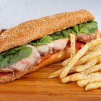 Chicken Parmesan Sub · Breaded chicken breast, Sunday sauce, parmesan, and Mozzarella toasted on a seeded Italian r...