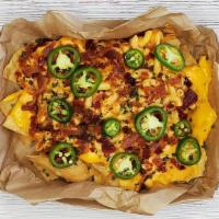 Dirty Mac Nachos · mac and cheese, bacon, jalapeno, cheddar sauce, chives