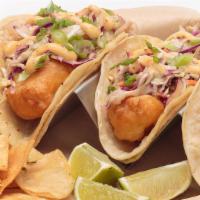 Fish Tacos · Your choice of grilled or beer-battered cod fillets, nestled in corn tortillas with our home...