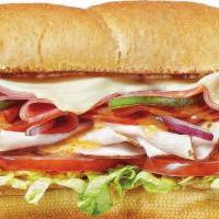Turkey Italiano Footlong Regular Sub · Tender oven roasted turkey with genoa salami, spicy pepperoni, melty American cheese. All on...
