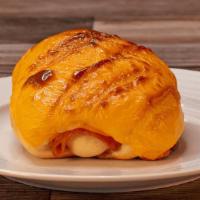 Ham & Cheese · A soft bread rolled with ham and American cheese.