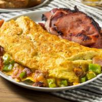 Denver Omelette · Diced ham, onions, red and green bell pepper, and cheddar cheese folded into a fresh made om...